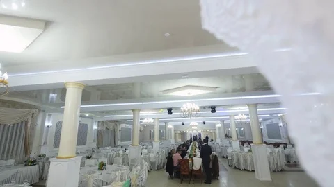 White restaurant interior with served table in the middle Stock Footage