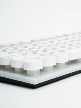 White retro round keycap keyboard close-up Stock Photos