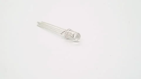 White RGB LED electronic component rotates on white background isolated. Vidéo 169365553