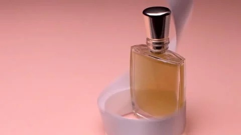 A white ribbon wraps around a bottle of Stock Video Pond5