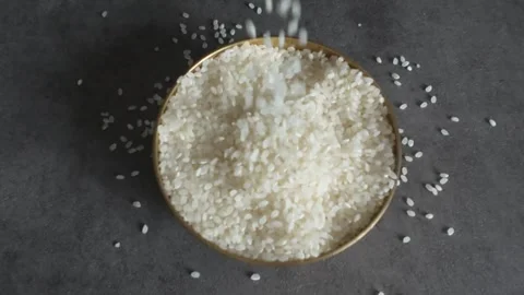 White rice in a brassware. Stock Footage 303397341