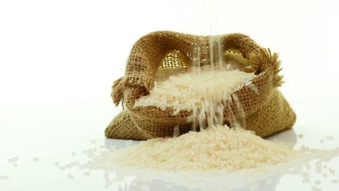 White rice falling with sack. 库存影片 89612396
