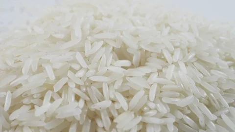 White rice falling slow motion Stock Footage 103982529