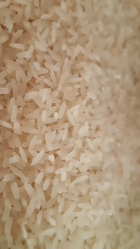 White Rice Grains Cascading in Close-Up Stock Footage 344655389