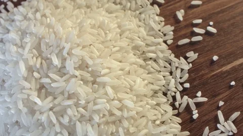 White rice heap on the table Vídeo Stock 79346582