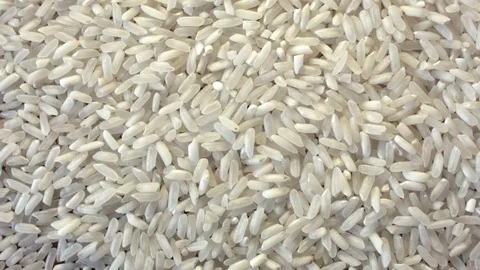 White rice heap on the table Stock Footage 79408374