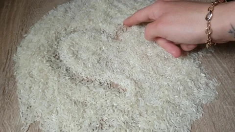 White Rice Heap On The Table Stock Footage 137907071