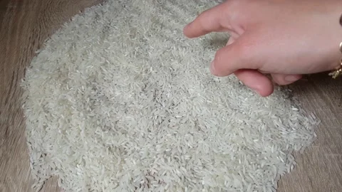 White Rice Heap On The Table Stock Footage 137907086