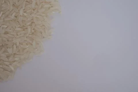White rice isolated on white background. Top view. Stock Photos
