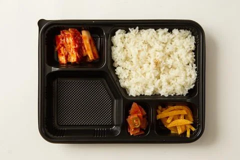 White rice in a lunch box Stock Photos