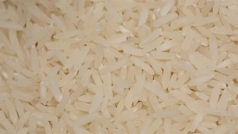 White rice in macro view for cooking, rice for pilaf Stock Footage 249953404