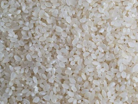 White rice texture background, close up shot of the rice background Stock-Fotos