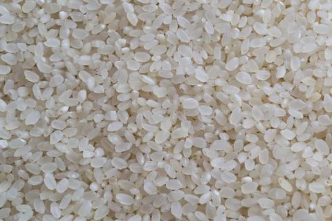 White rice texture background, close up shot of the rice background Stock-Fotos