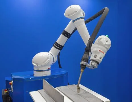 White Robot Arm Welding Stock Photos