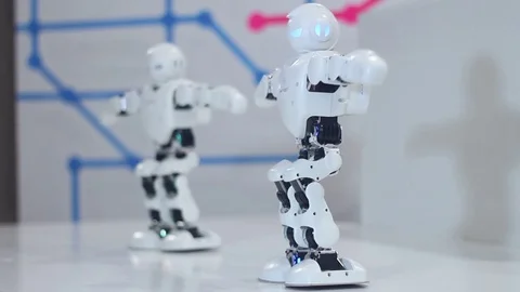 White robot dance for people Stock Footage 81785734