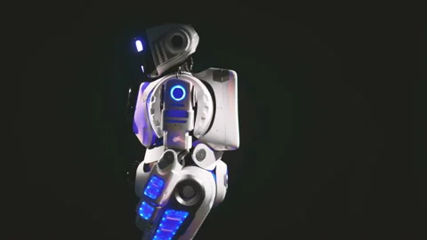 A white robot turns to the camera and waves its hand. Stock Footage 88435025
