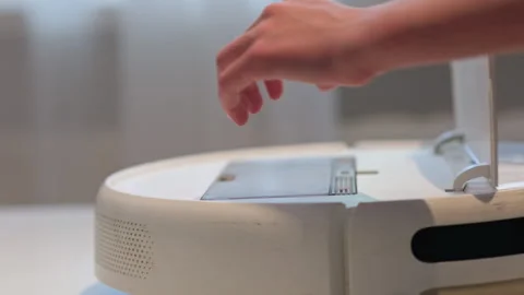 White robot vacuum cleaner with traces of use. Stock Footage 313437689