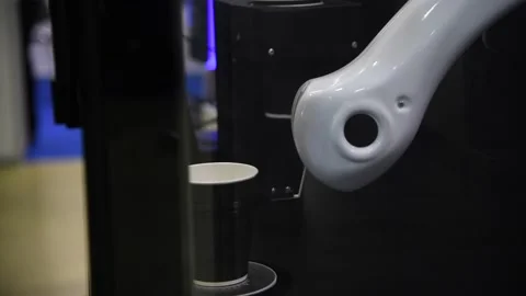 White robotic arm with paper coffee cup Video stock 237462475