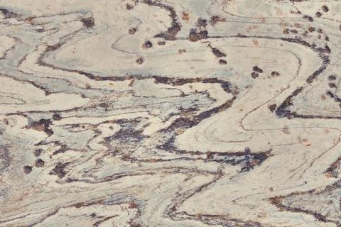 White rock background with dark lines The texture stone with a curved pattern Foto stock