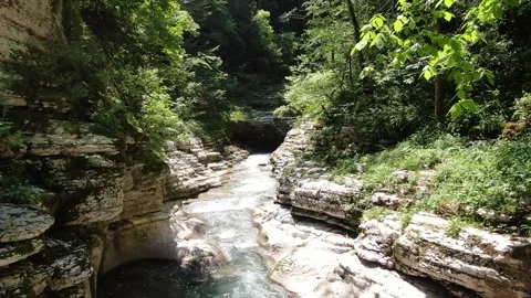White Rock Canyon, Khosta River Along Cliffs in forest . Sochi, Russia Stock Footage 314817433
