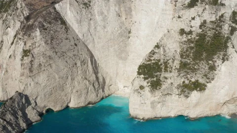 White rock Zakynthos cliffs by a small hidden beach in Greece -Aerial Stock Footage 160727542