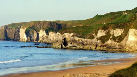 White Rocks in warm evening light, Northern Ireland Stock Footage 64208555