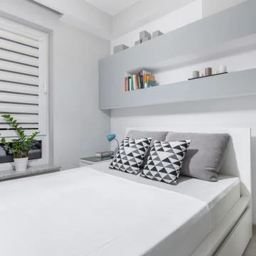 White room with double bed Stock Photos
