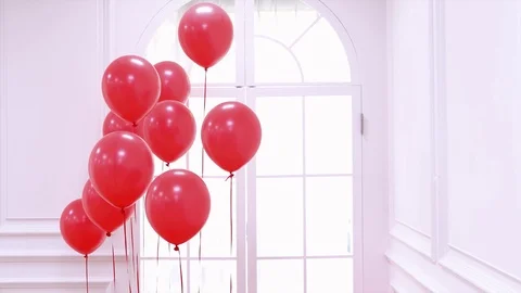 White room with Red Balloons Stock Footage 95967512