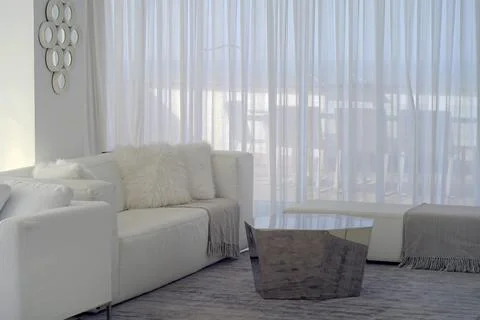 White room with sofa Stock Photos
