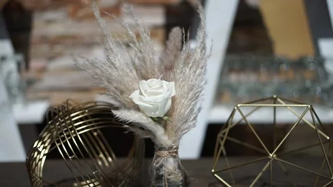 White rose moving in the light breeze, part of a beautiful outdoor event decor Stock Footage 223103702