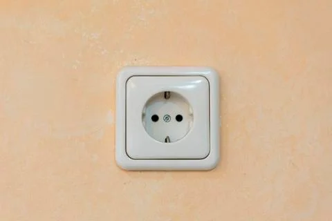 White rosette on a beige wall Stock Photos