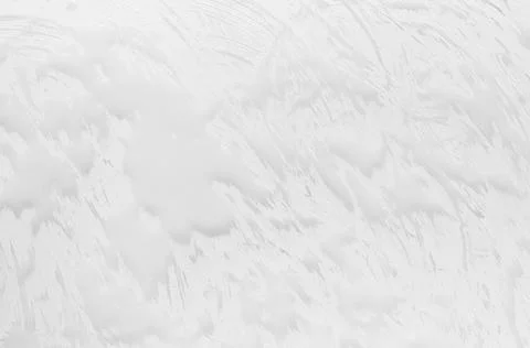 White rough dry plaster texture with waves as surf as simple abstract backgro Stock Photos