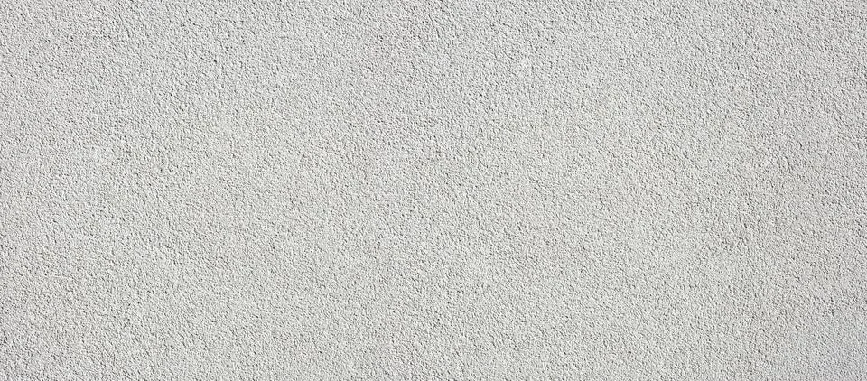 White rough plaster wall texture background surface Stock Photos