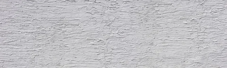 White rough stucco wall texture background pattern Stock Photos