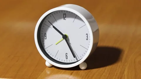White round analog clock time lapse showing sped up three hours 9 to 12 o'clock Stock Footage 287021555