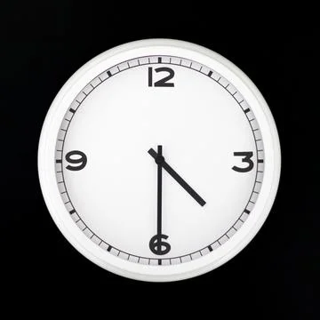 White round analog wall clock isolated on black background. Stock Photos