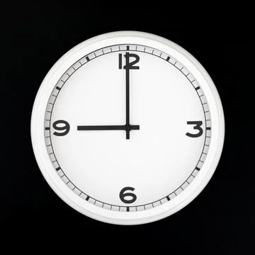 White round analog wall clock isolated on black background. Stock Photos