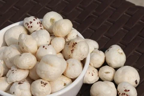 White round nut with seed Stock Photos