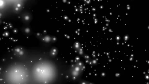 White round particles move slowly against a black background. computer graphics Stock Footage 89762733