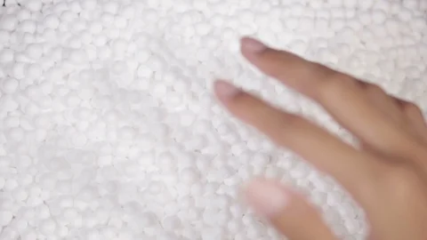 White round polystyrene packaging material with male hand touching Stock Footage 119767535