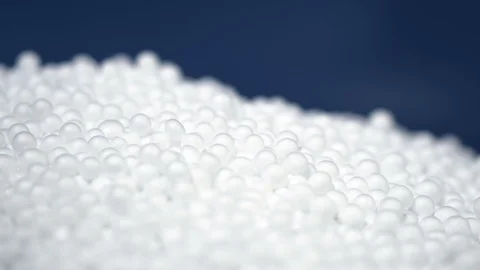 White round polystyrene packaging material in pan shot Stock Footage 119767886