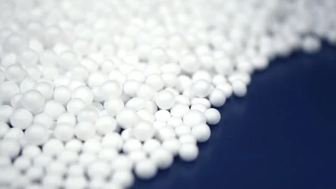 White round polystyrene packaging material in pan shot Stock Footage 119768047