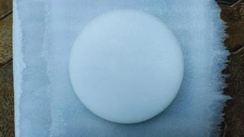 White round shaped  snow abstract texture background with surface Foto stock