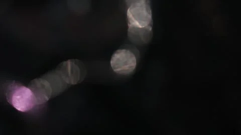 White row bokeh light in the black on the left 스톡 동영상 317449133