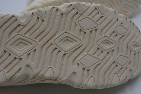 A white rubber sole with pattern from the new white sneakers. 스톡 사진