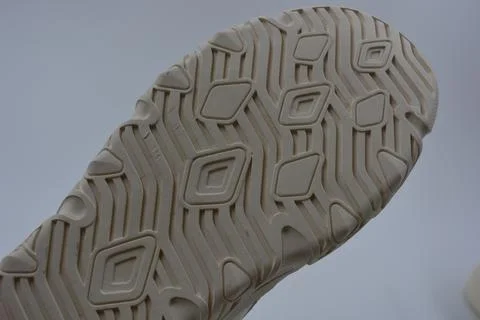 A white rubber sole with pattern from the new white sneakers. 스톡 사진