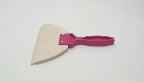 White rubber spatula rotates on a white background. Vidéo 266994898