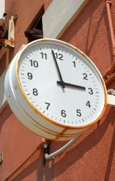 White rusty clock station Stock Photos