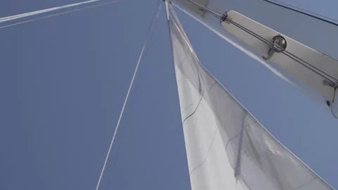 White sail of the yacht develops in the wind 動画素材 219938735