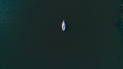 White sailing boat on the river, top view. Copter ( drone ) shooting Stock Footage 119512249